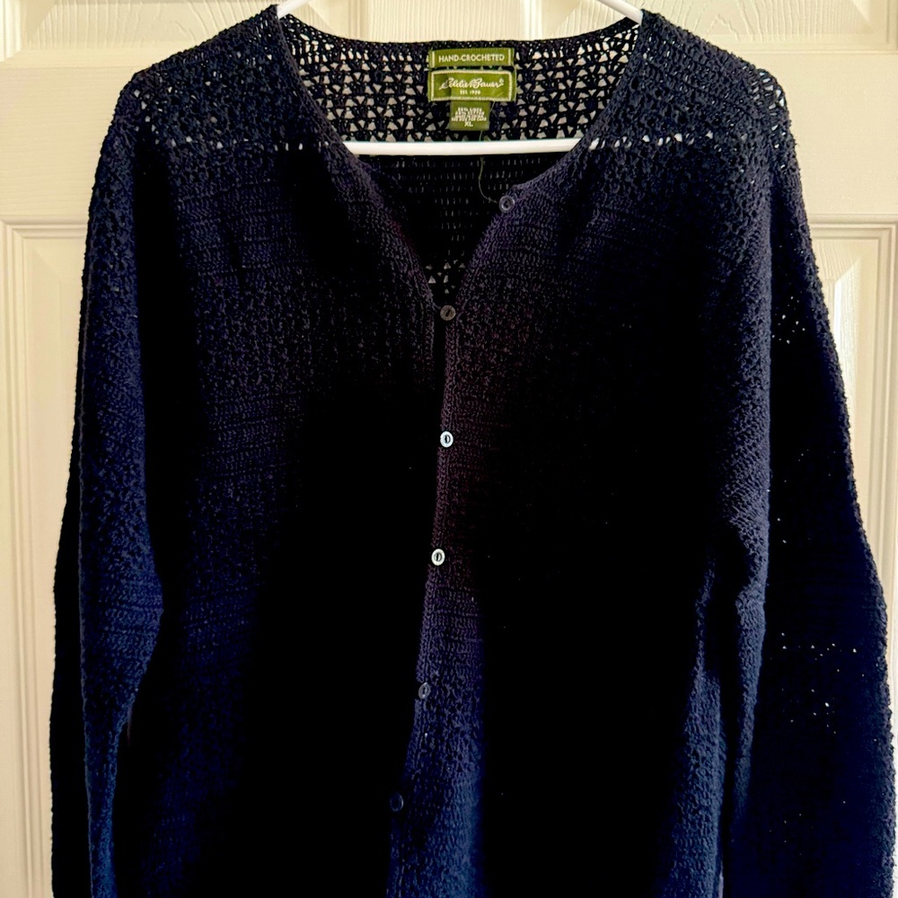 Eddie Bauer Black sweater with 3/4 inch sleeves. Small black button closure